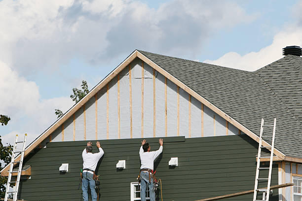 Professional Siding Contractor technician working in Enfield, NC
